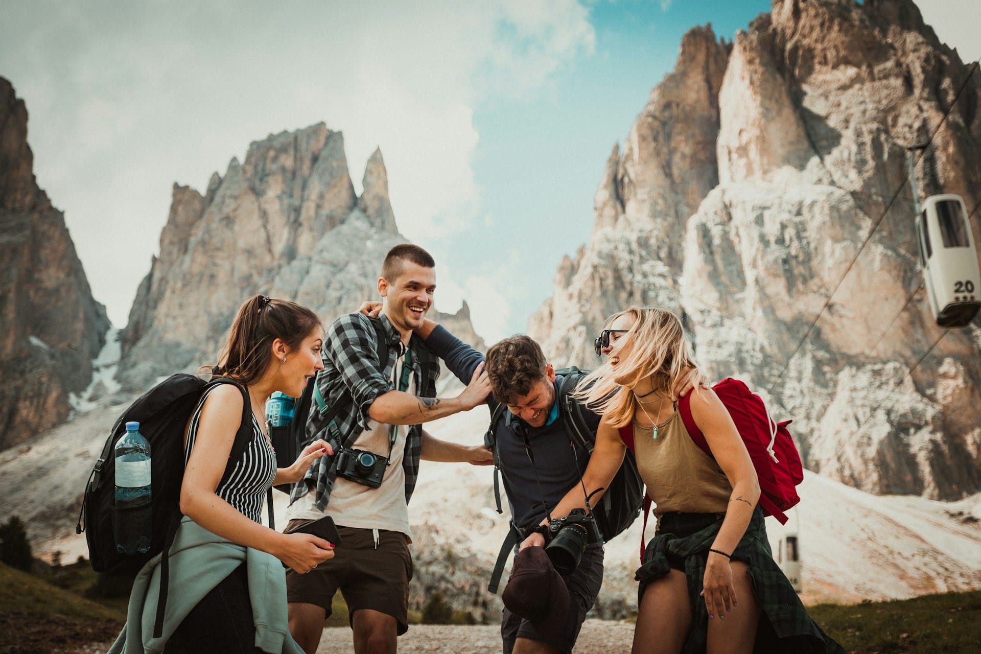 group of friends smiling and hiking