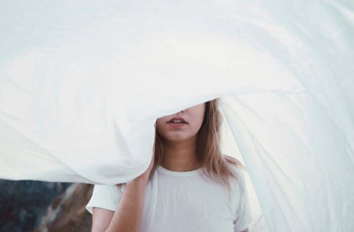 woman's face partially covered so showing only her mouth