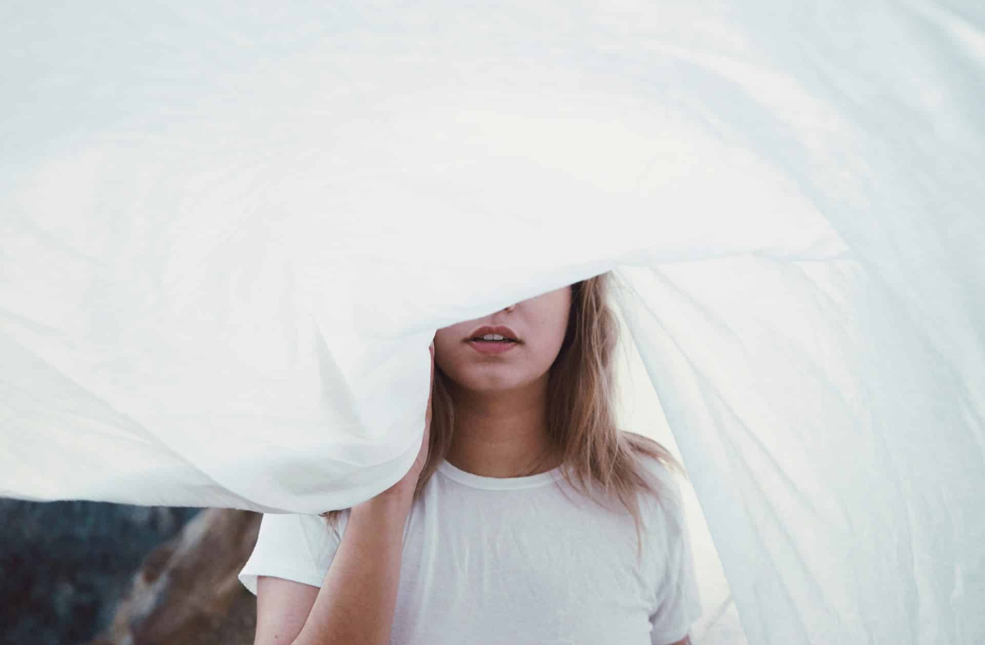woman's face partially covered so showing only her mouth